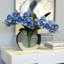 Arrangement floral orchidée dans un vase miroir-97821096