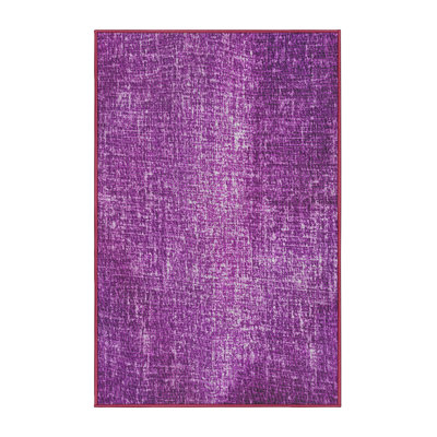 Tapis violet tissé à la machine