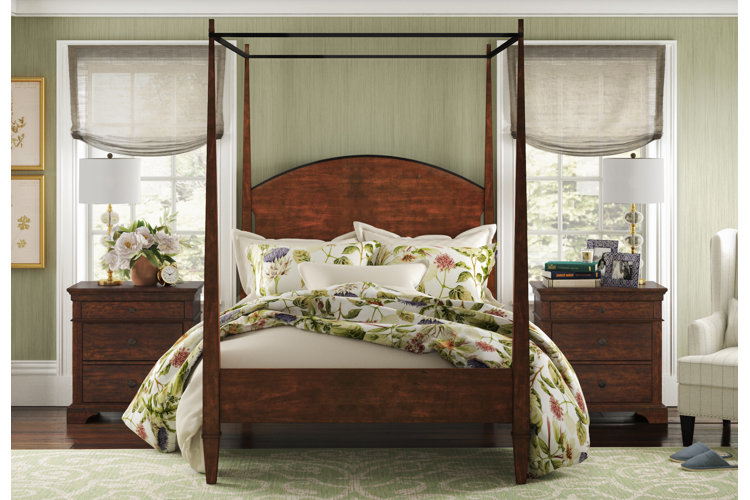 sage green bedroom with dark wood bed furniture