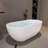 63 in. Freestanding Soaking Solid Surface Bathtub-98606634