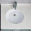Lavabo de salle de bain ovale blanc encastré avec trop-plein