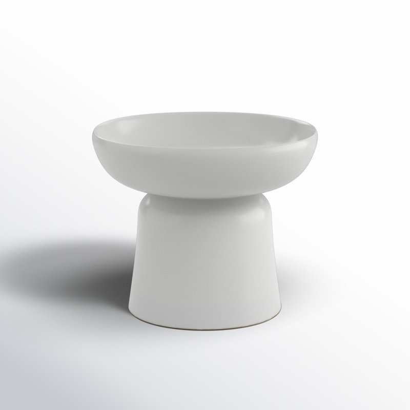 A white candy bowl with a tall base