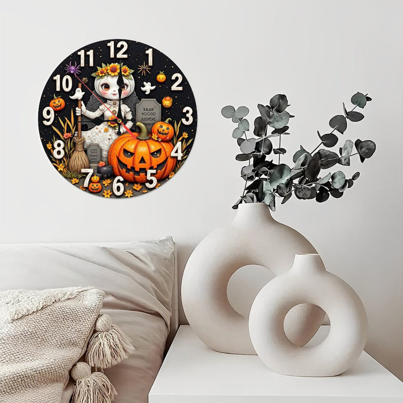 Horloge d'Halloween avec citrouilles d'Hirondelle