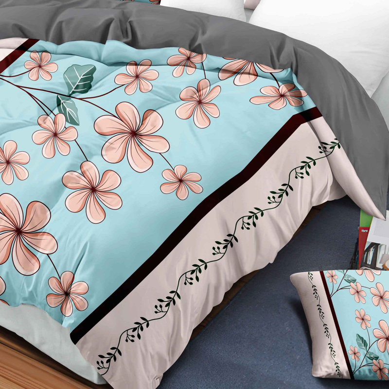 Ensemble de 9 pièces comprenant un couvre-lit et des rideaux matelassés bleu et rose à motif gardénia, avec 6 panneaux indépendants filtrant la lumière.
