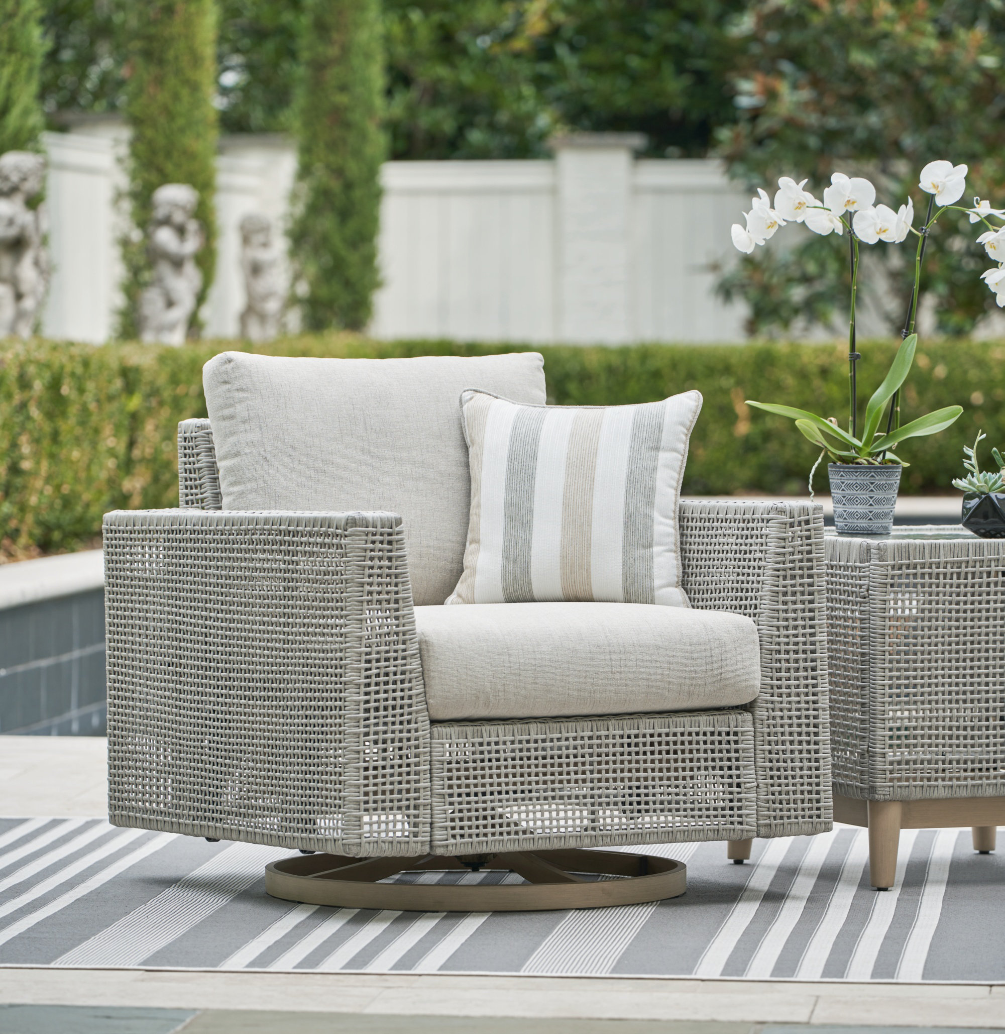 Signature Design by Ashley Seton Creek Outdoor Swivel Lounge With ...