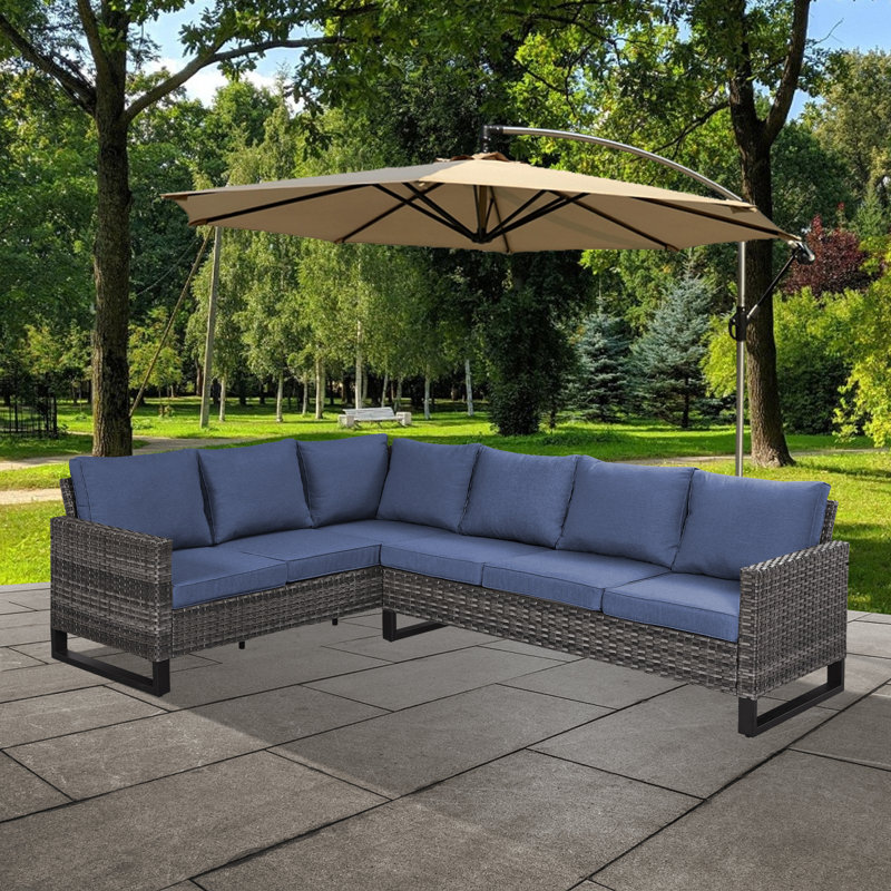 Naresa Wide Outdoor Wicker Patio Sectional with Cushions, Navy