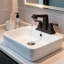 Robinet de lavabo de salle de bain central en métal huilé 4 pouces à 4 poignées avec bonde escamotable et conduites d'alimentation
