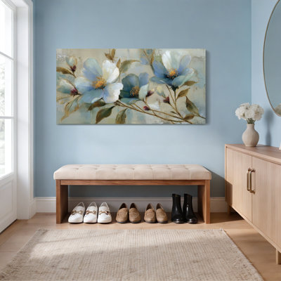 Tableau mural en toile tendue à motifs floraux bleus et blancs, idéal pour la décoration du salon et de la chambre.