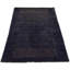 Porschea Polka Dots Area Rug in Black