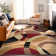 Mehul Geometric Multi Coloured Area Rug in Red/Brown/Black