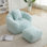 Fauteuil à billes avec repose-pieds en fausse fourrure
