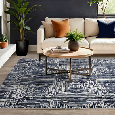 Brenetta Geometric Shapes Area Rug