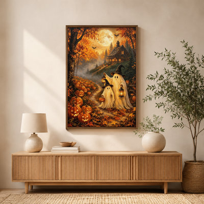 Tableau sur toile fantastique avec cadre flottant, prêt à accrocher, représentant deux silhouettes fantomatiques, des lanternes et un chemin illuminé de citrouilles, sur un thème d'Halloween.