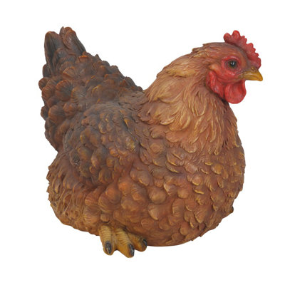 Statue de poule accroupie
