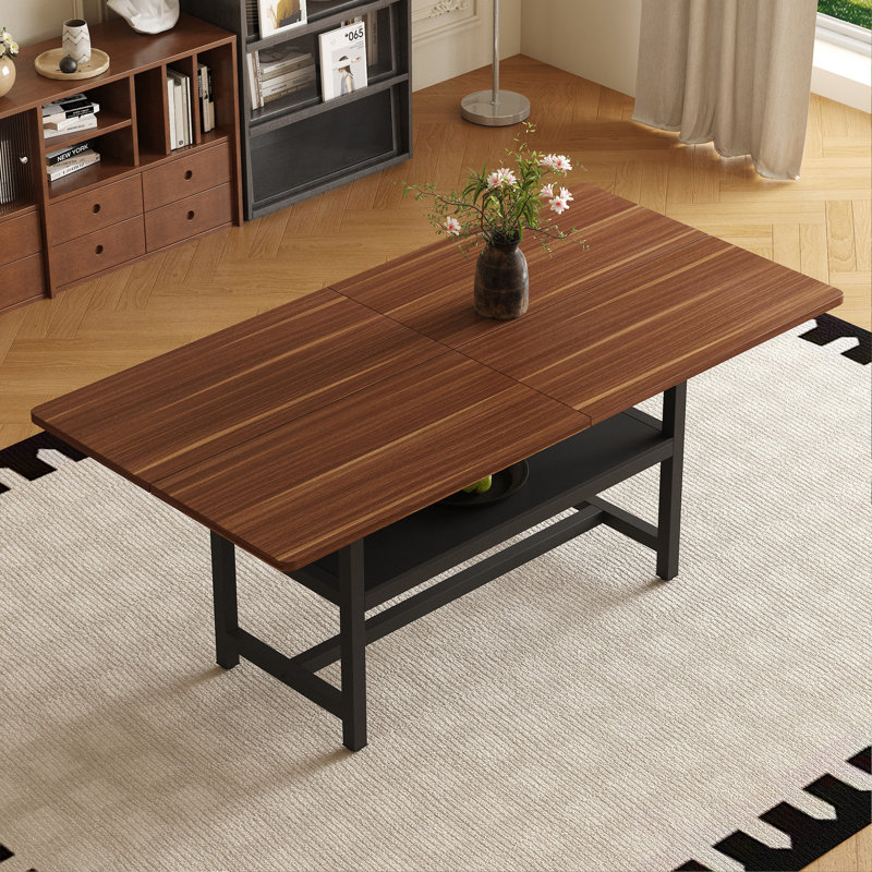 Une table de salle à manger de 71 x 35,4 pouces avec un plateau habilement assemblé par quatre panneaux de fibres à densité moyenne texturés. Le bureau possède une plateforme de rangement de 43,3 x 19,7 po. Très approprié pour les réunions de famille, etc.