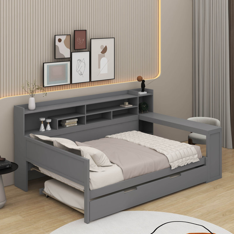 Lit de jour en bois avec tablettes de rangement, lit multifonctionnel avec lit gigogne simple et bureau d'étude
