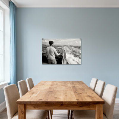 Fashion Man Steering Boat On Ocean Waves