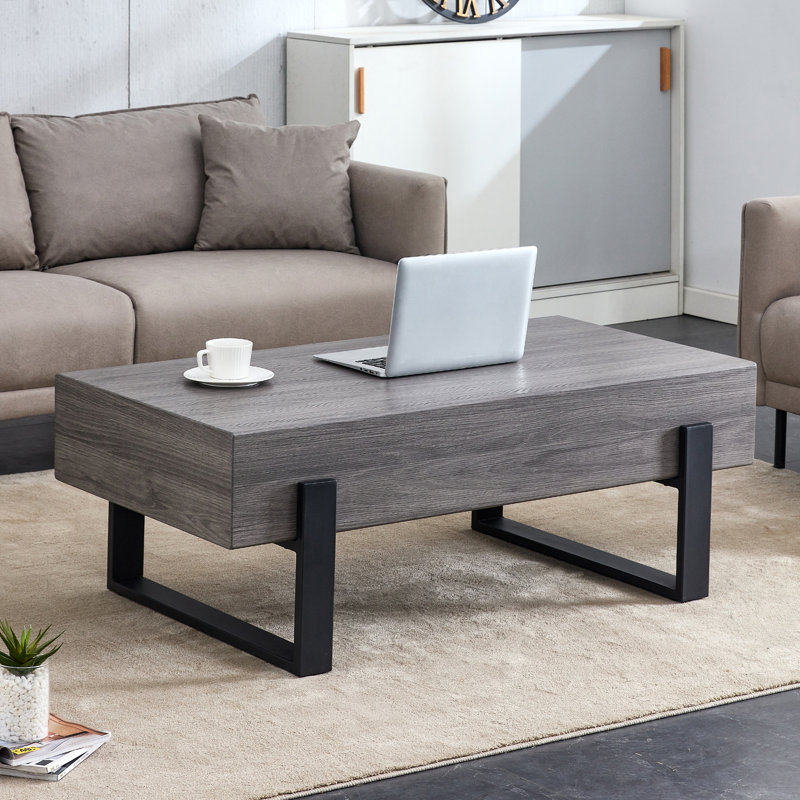 Table basse 47,2 po x 23,6 po en bois aggloméré texturé noir et gris. Autocollant texturé gris, revêtement en métal noir par pulvérisation, table basse en bois aggloméré. Présentant un style moderne et simple.