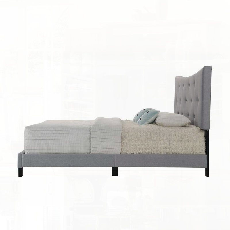 Grand lit gris en tissu