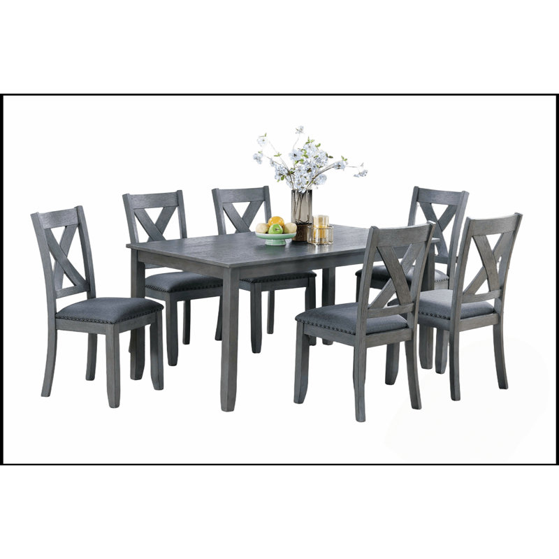 Ensemble de salle à manger 7 pièces à finition grise avec chaises à dossier en X rembourré et style moderne pour des salles à manger élégantes