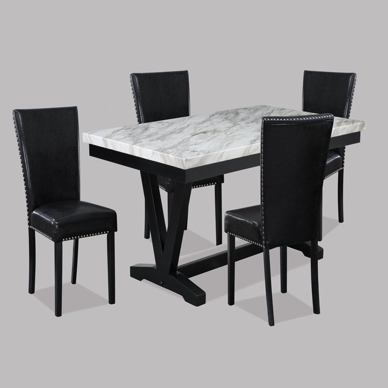 Ensemble de table de salle à manger en simili marbre blanc et finition noire Ensemble de chaises rembourrées en similicuir noir