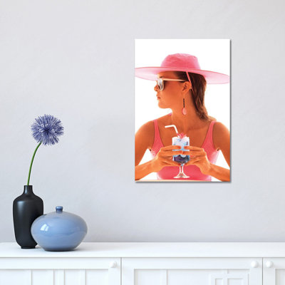 " 1980s Young Woman In Bathing Suit Having A Drink " by Vintage Images