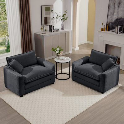 Ensemble de canapés profonds luxueux et sophistiqués avec deux chaises simples en velours côtelé gris, convenant à la chambre à coucher et au bureau