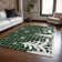 Machine Washable Indoor/Outdoor Christmas Reindeer Xhevrie Green Rug