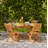 Nayoun 4 - Person Acacia Wood Patio Dining Set with Rectangular Table