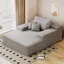Chaise longue surdimensionnée en fausse fourrure moelleuse, idéale pour une détente confortable et un décor de salon élégant, gris