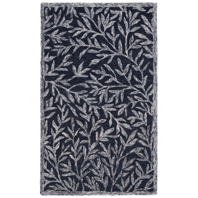 Alduina Floral Handmade Tufted Area Rug in Navy/Ivory