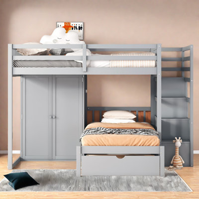 Lit superposé double au-dessus de simple avec garde-robe et tiroirs