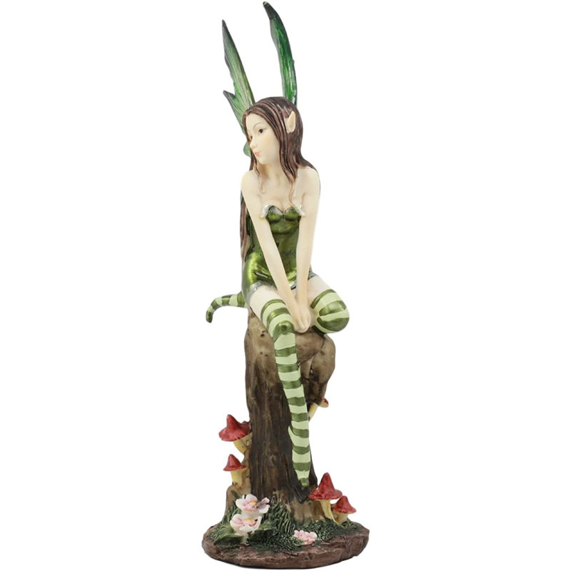 Statue de fée menthe poivrée fantaisiste Ceason assis sur une souche d'arbre