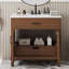 Meuble-lavabo en rotin avec lavabo en céramique, portes à fermeture douce et grand rangement, parfait pour les salles de bain modernes et élégantes.-2069257664