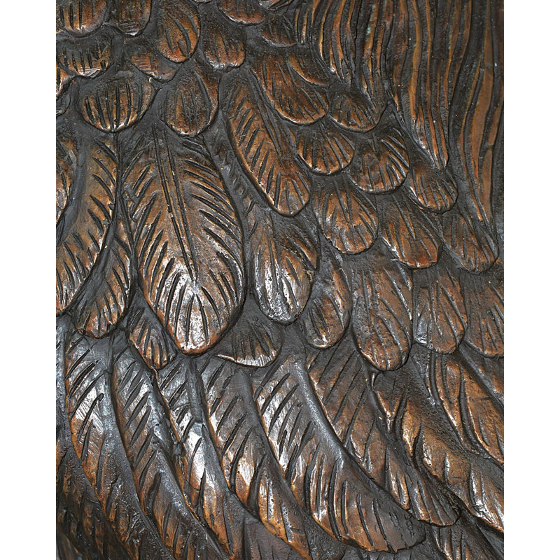 Hérons sur une branche bronze