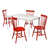 Table blanche avec chaises rouges