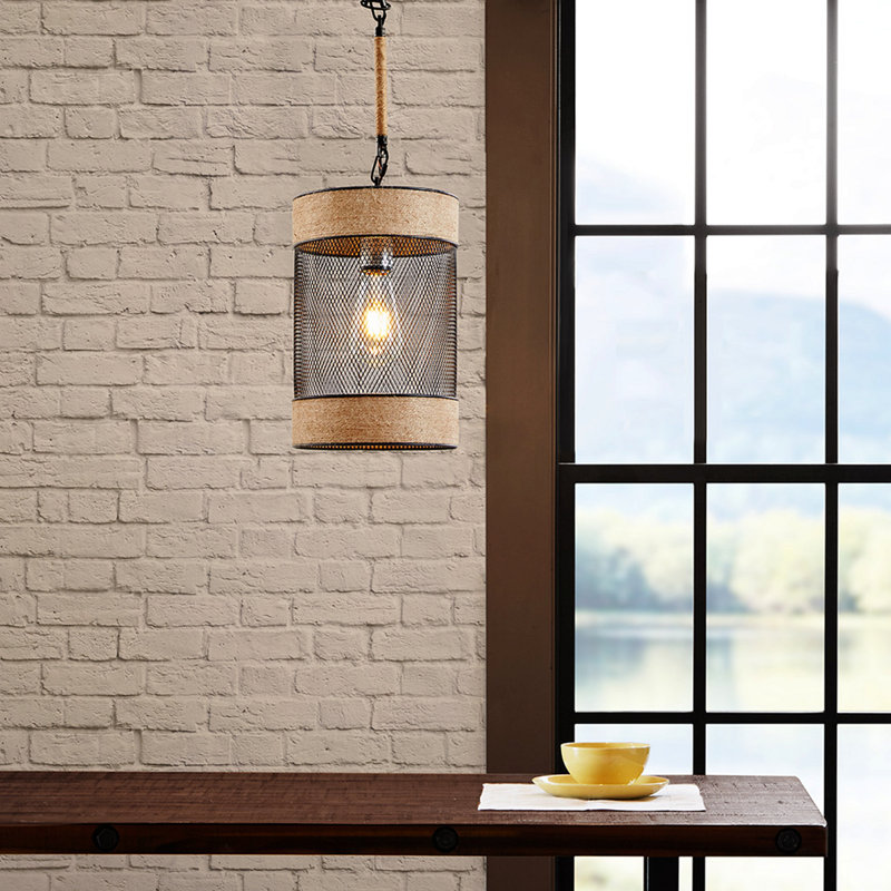 Luminaire suspendu en corde naturelle et cylindre en métal