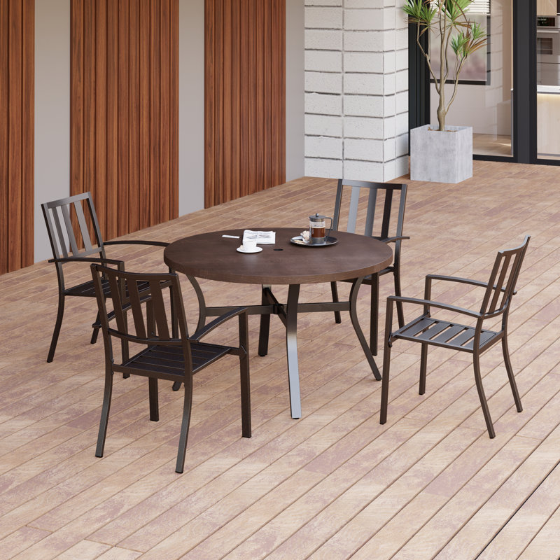 Armisha 4 - Person Patio Dining Set with Round Table