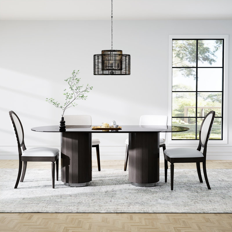 Tralyn Oval Glass Top Dining Table
