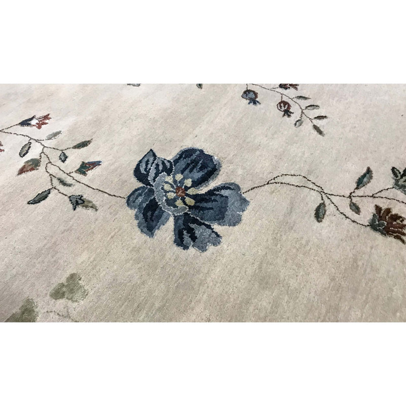 Tapis ivoire et doré de haute qualité noué à la main