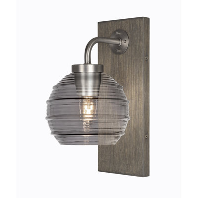 Oxbridge Wall Sconce Shown In Graphite & Painted Distressed Wood-look Metal Finish With 6" Smoke Ribbed Glass