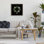 Feuilles et fleurs sauvages sur cadre flottant noir, design par Beth Adoette