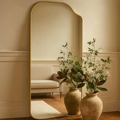 Miroir de plancher asymétrique doré Ellara