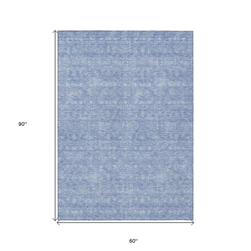Tapis extérieur lavable floral bleu ciel et ivoire 5 pi x 8 pi