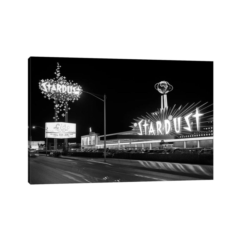 1960s Night Scene Of The Stardust Casino Las Vegas Nevada USA by Vintage Images - Wrapped Canvas Print