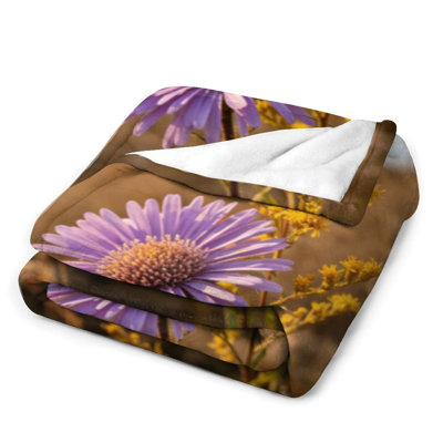 Jeté en flanelle mauve à motif floral mauve, couverture douce et chaude pour le canapé du salon