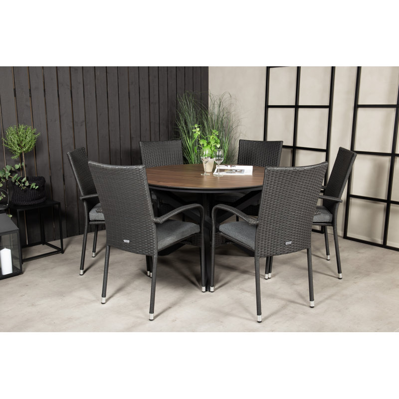 Drishya 6 - Person Patio Dining Set with Round Table , Cushions Included