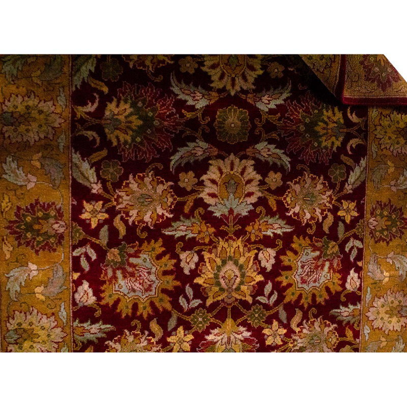 Tapis rouge et or de haute qualité noué à la main