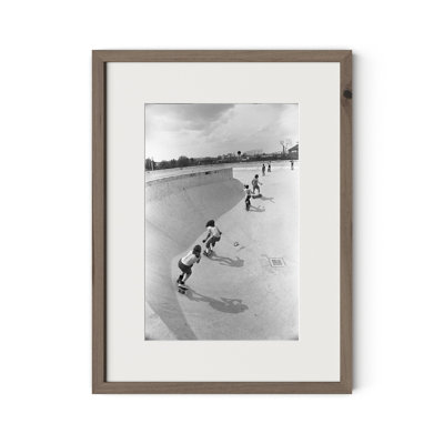 Skateboarding In A Drained Pool II Framed Photographic Print