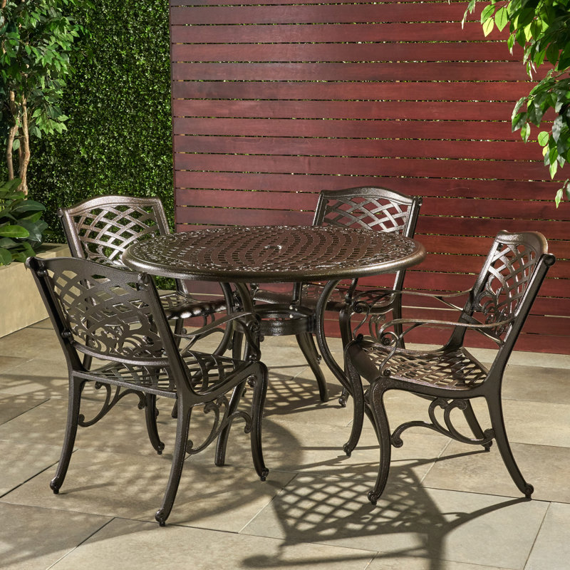 Chachere 4 - Person Patio Dining Set with Round Table